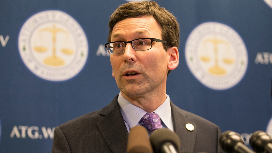 Photo: Washington Attorney General Bob Ferguson speaks during a press conference at his office on F...