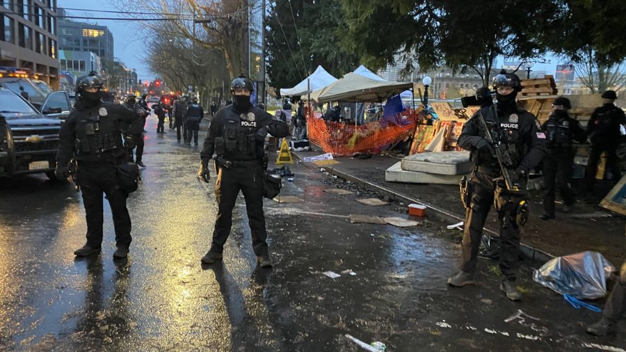 Photo: Police clean up a resurgence of CHOP in Seattle....