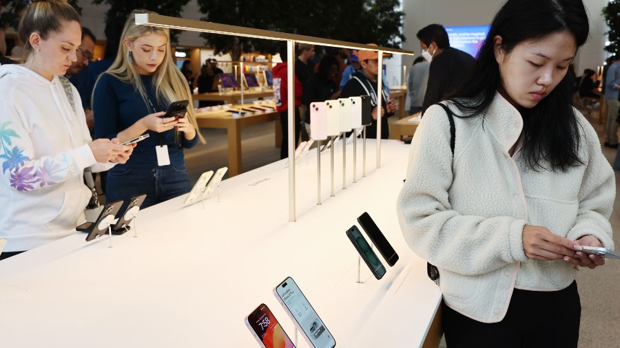 Image: New Apple iPhone 15 models are displayed in the Apple store at The Grove in Los Angeles on t...