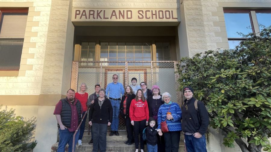 Photo: Parkland residents gathered on the steps of the 1908 Parkland School Friday morning to celeb...