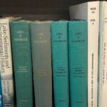 Multiple copies of Lakes of Washington reside on the shelves inherited by scientist Will Hobbs at the Washington State Department of Ecology. (Photo courtesy of Will Hobbs)