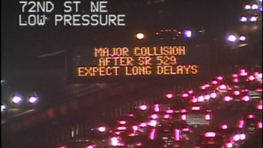 Image: After an I-5 south vehicle crash on Sunday, March 3, 2024, a traffic sign the Washington Sta...