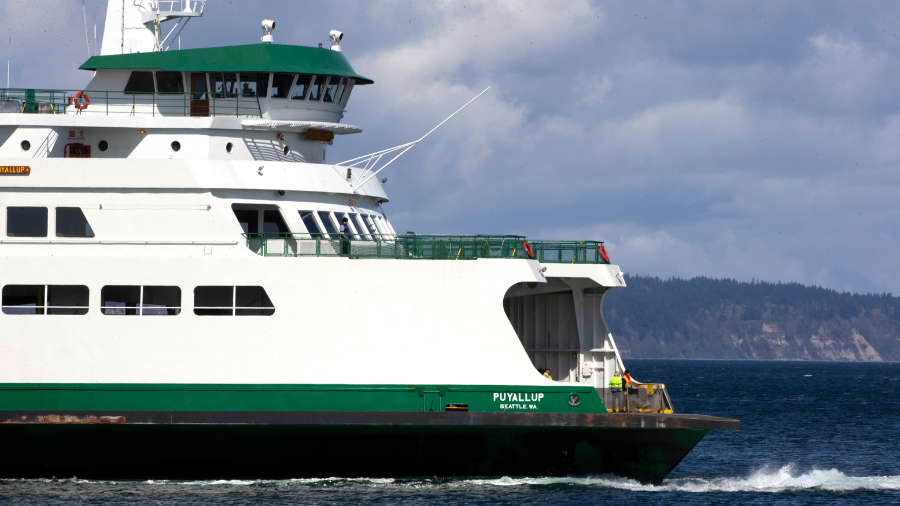 Photo: A Washington State ferry pulls up to the dock on March 29, 2020 in Edmonds, Washington....
